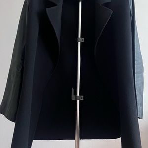 wool coat with natural leather sleeves